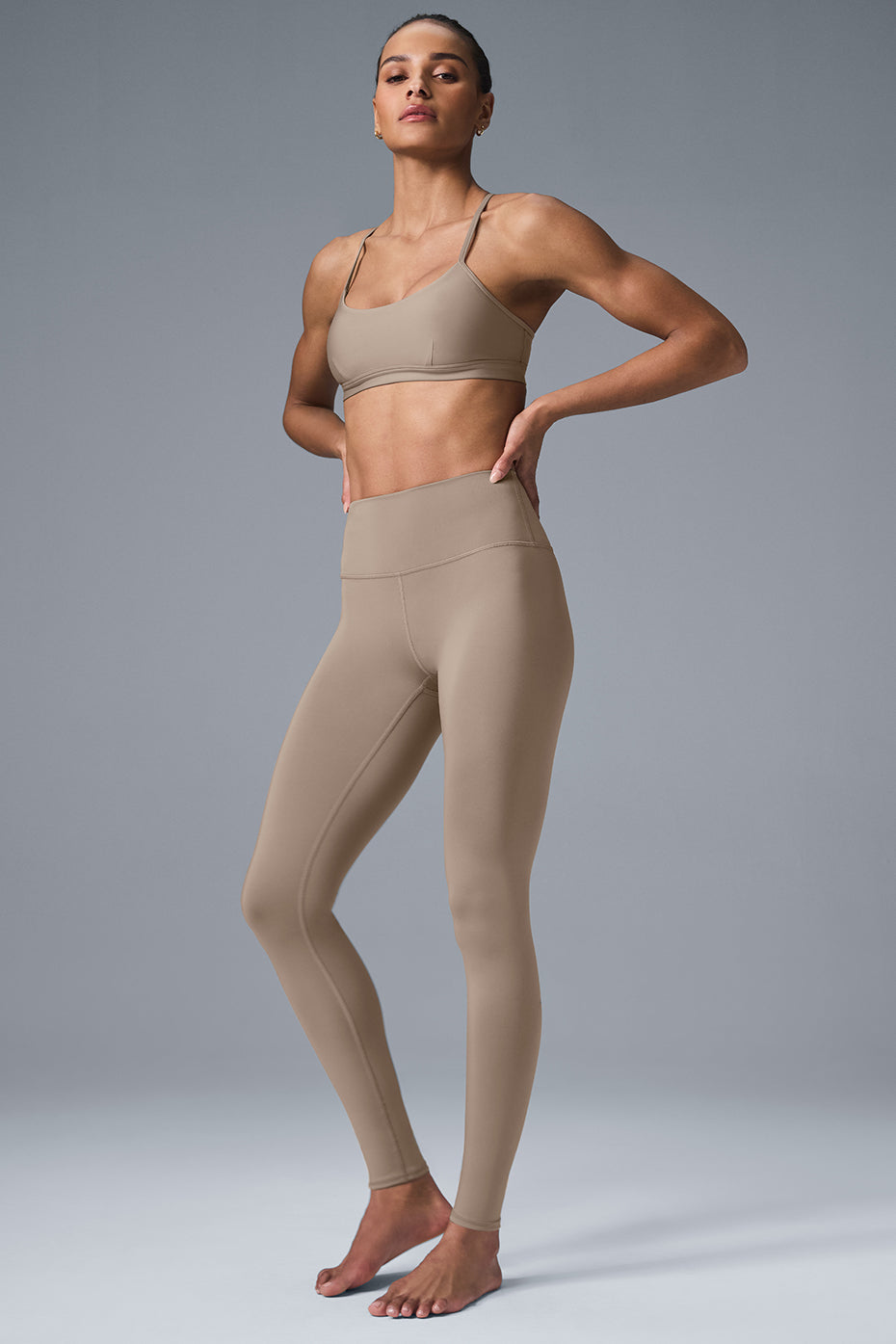 Front view of the supportive sports bra with scoop neckline and keyhole cutout