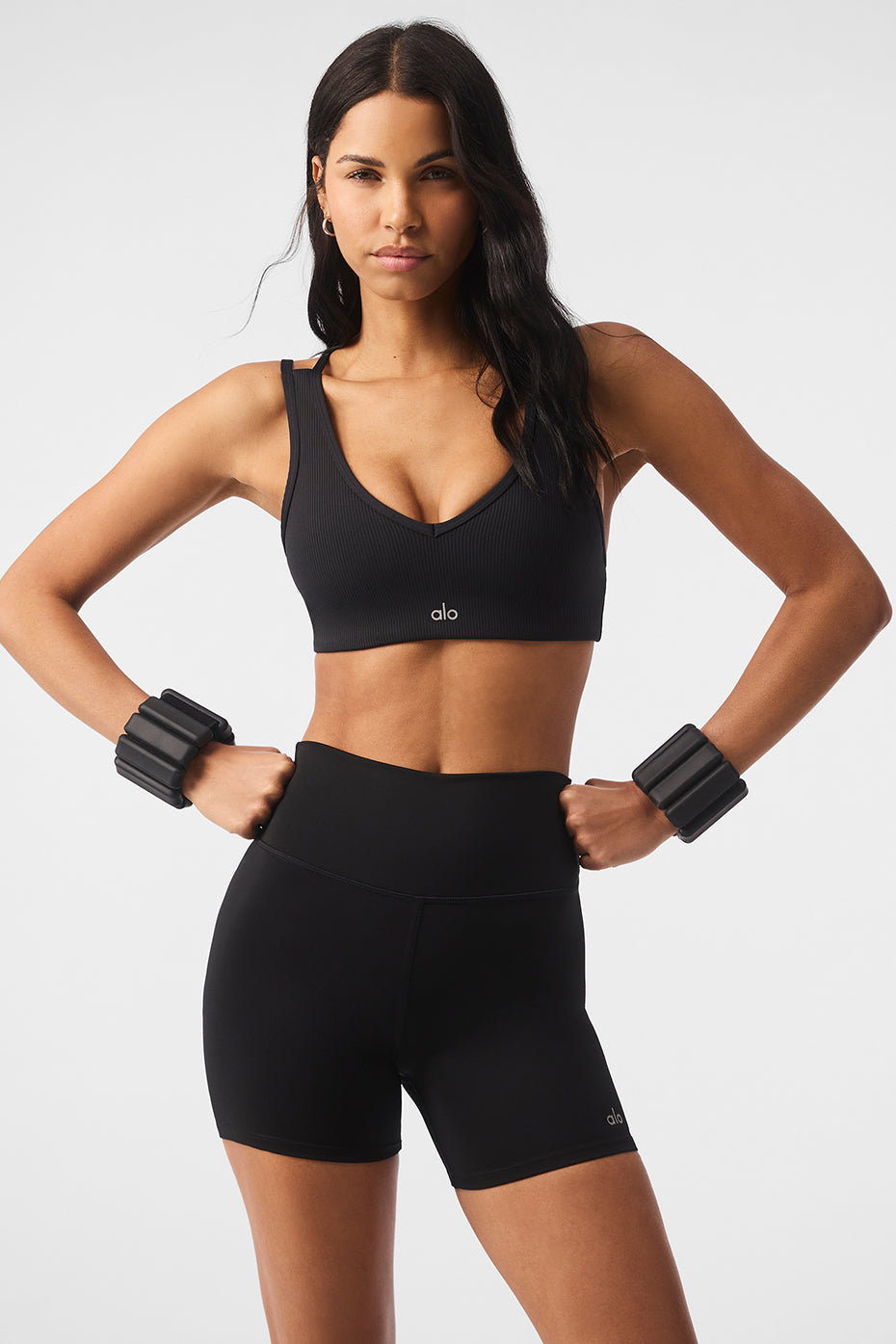 Black Airlift ribbed V-neck racerback bra shown from the front, ideal for yoga.