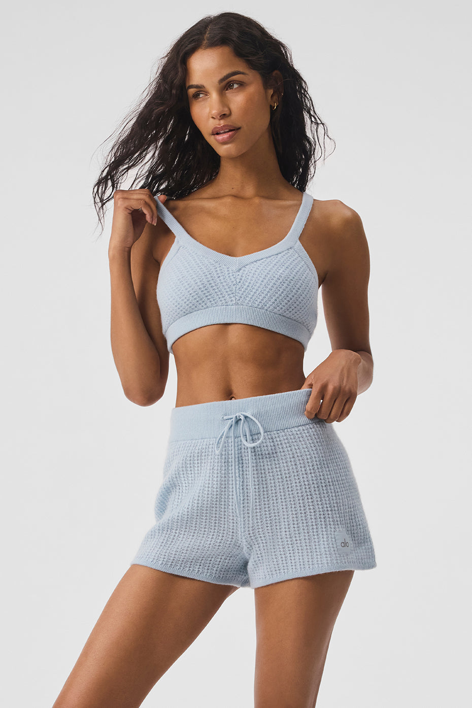 Front view of the luxurious cashmere waffle bra in crystal blue, highlighting its V-neck and thin straps.