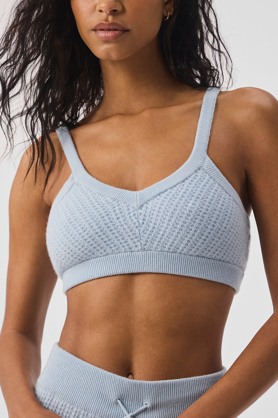 Front view of the luxurious cashmere waffle bra in crystal blue, highlighting its V-neck and thin straps.