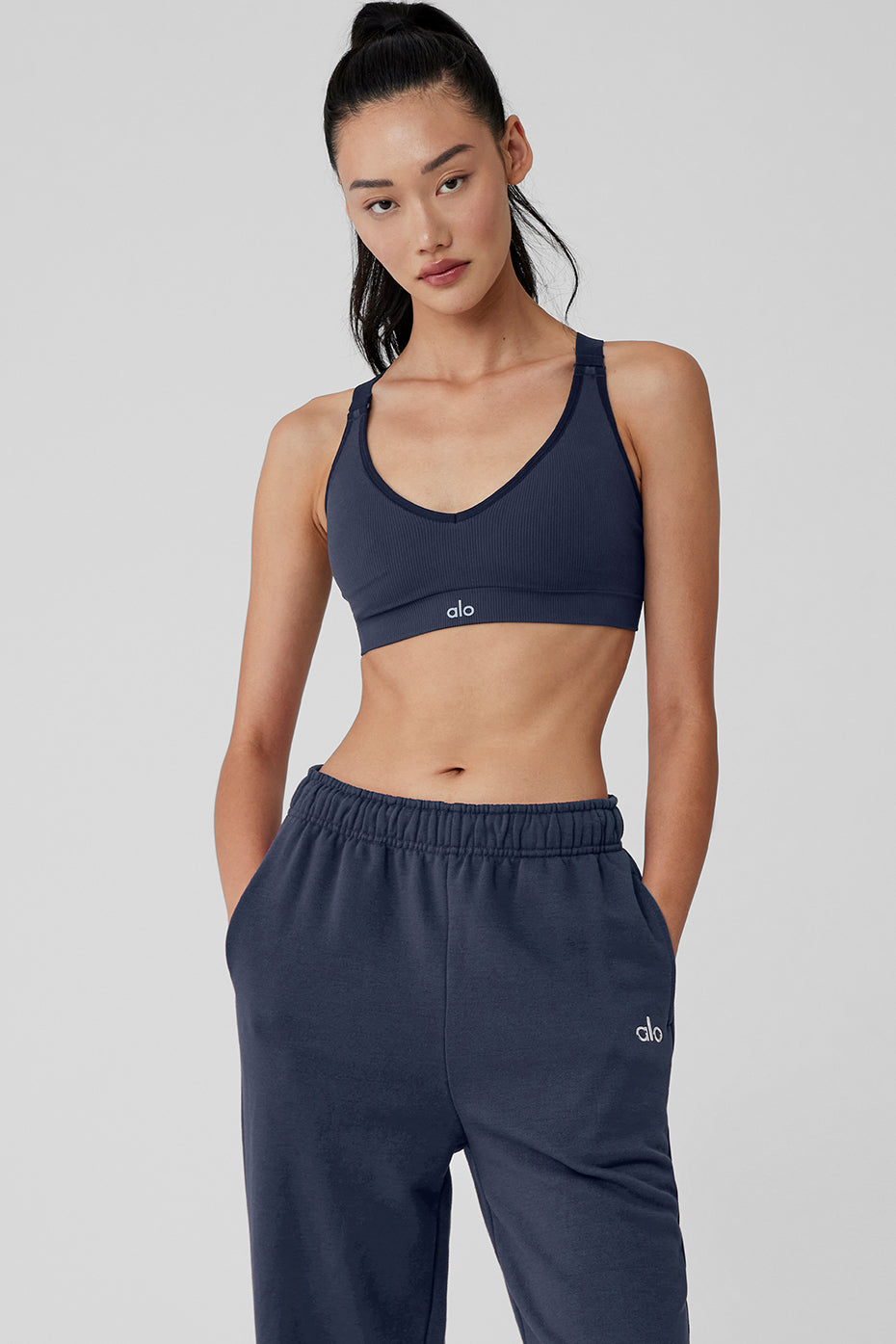 Close-up of the seamless ribbed fabric and hook-and-eye back closure