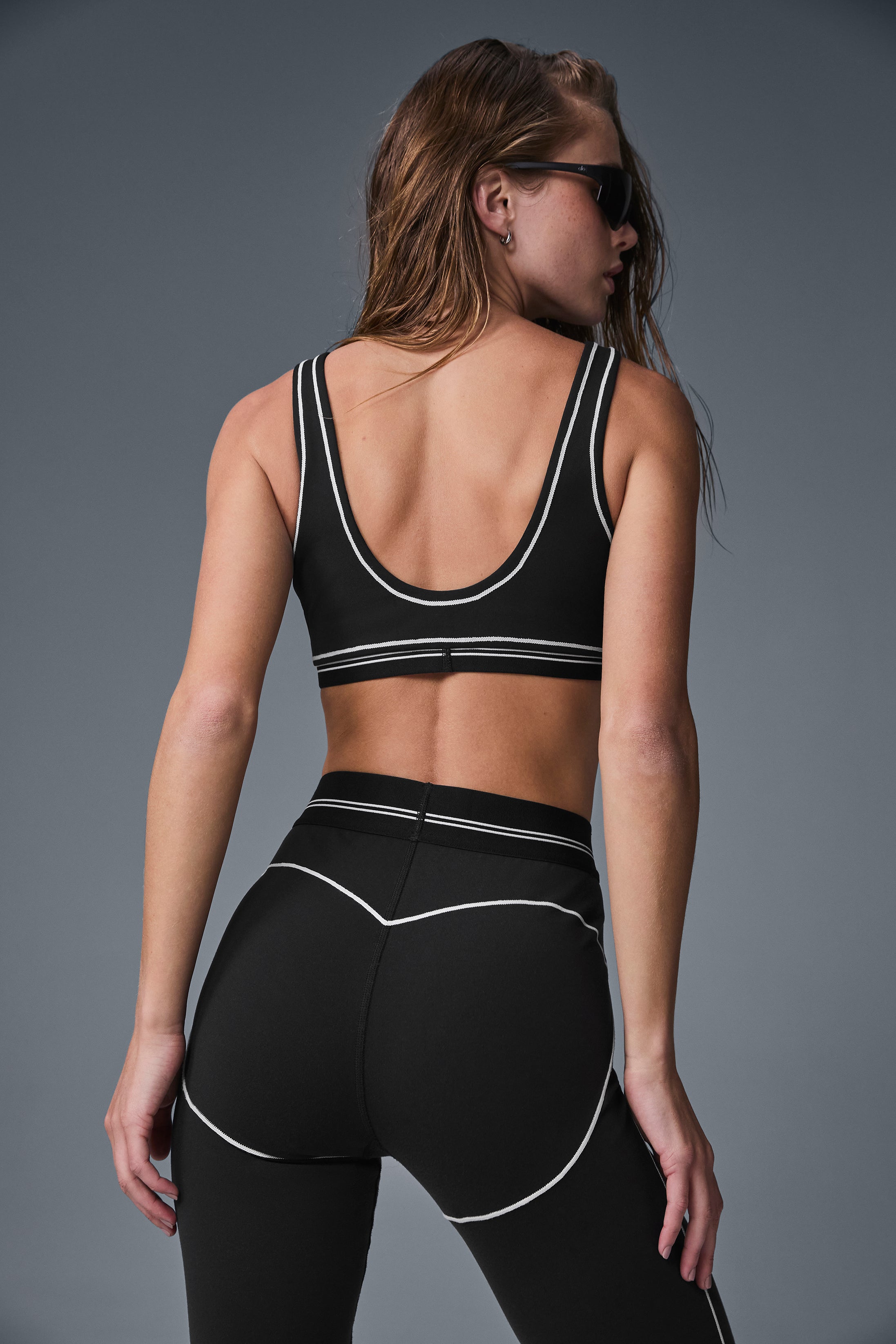 Front view of the Airbrush Heart Throb Yoga Bra in black and white.