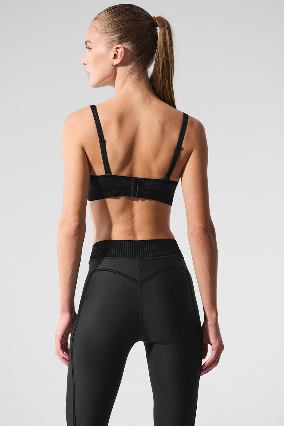Front view of Airlift Ultra-Light Yoga Bra in black, showcasing adjustable straps.