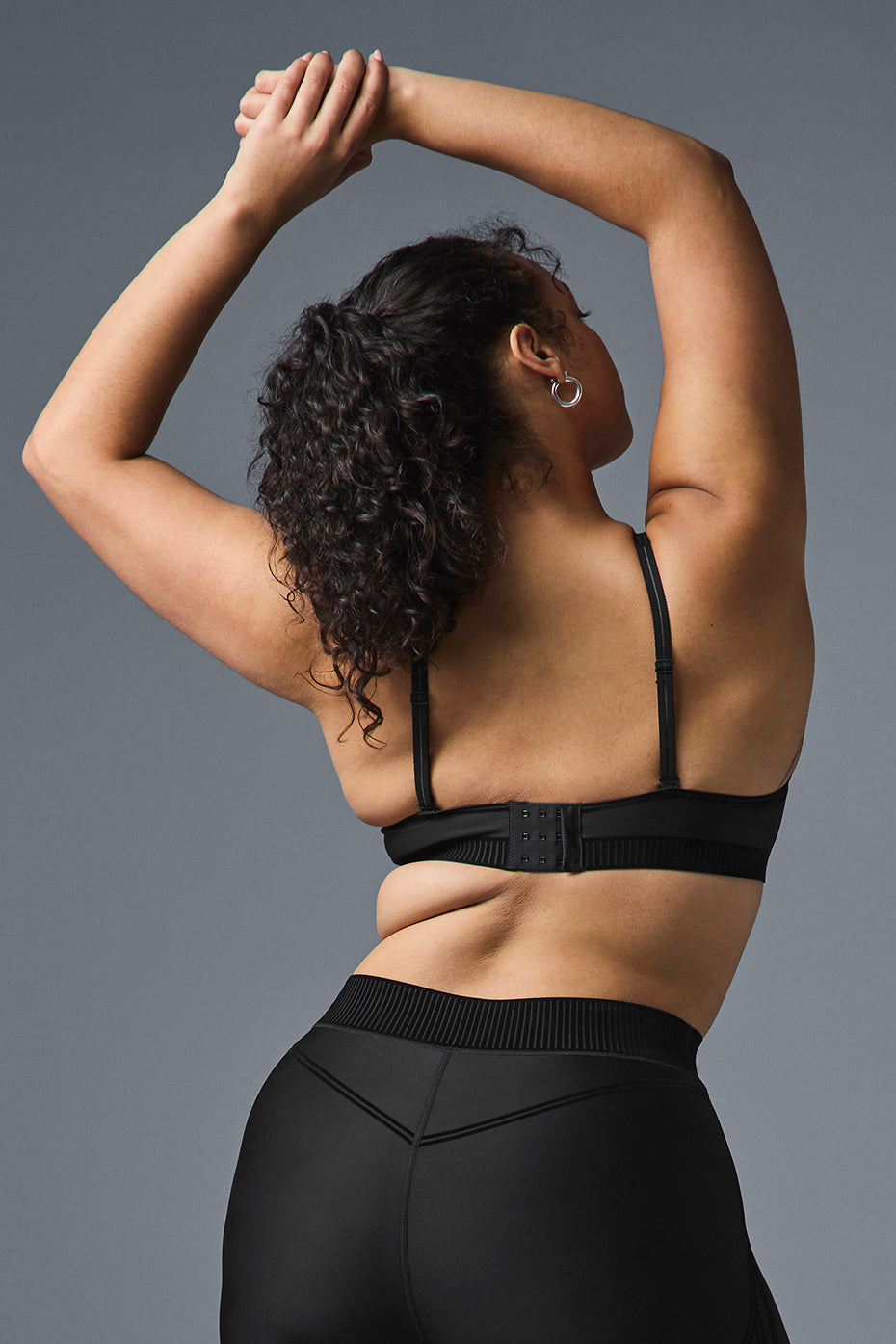 Front view of Airlift Ultra-Light Yoga Bra in black, showcasing adjustable straps.