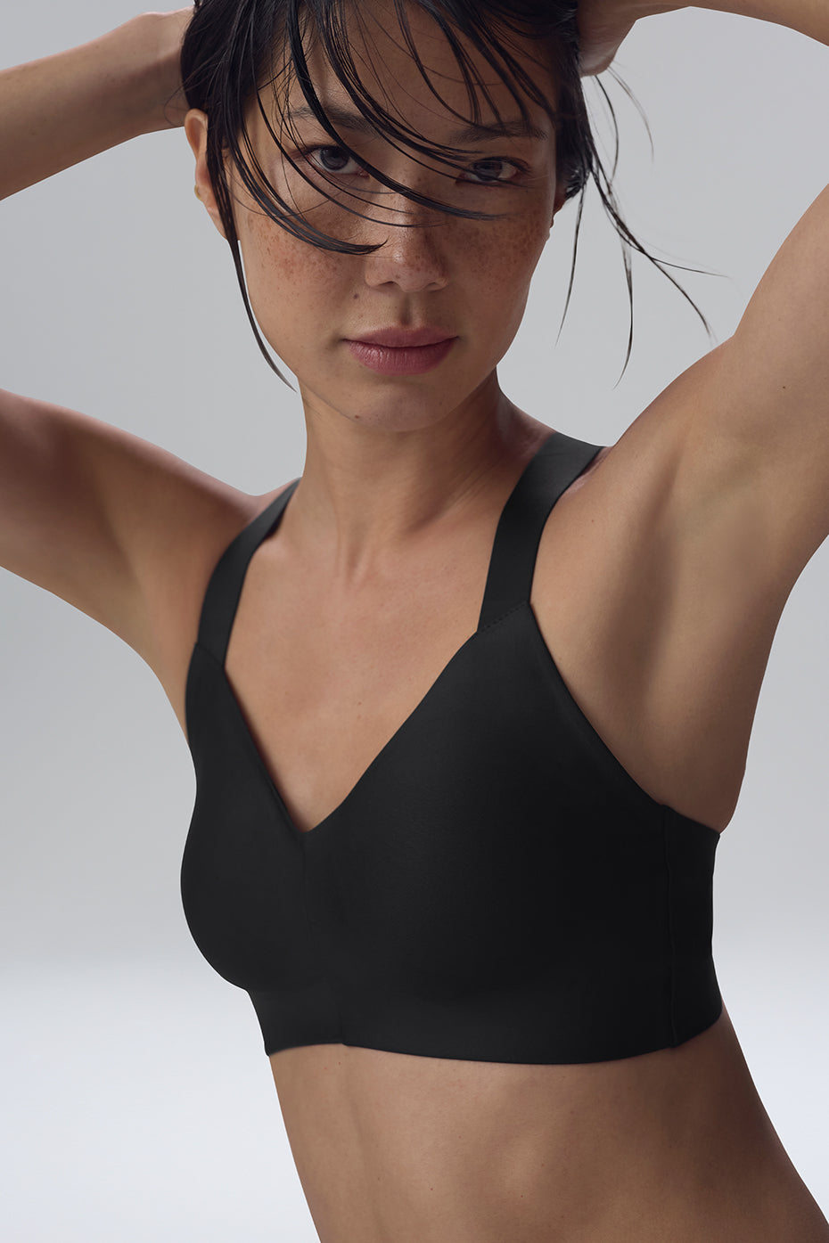 Side profile of the Airlift Strength Sports Bra showing snug underbust band and supportive structure