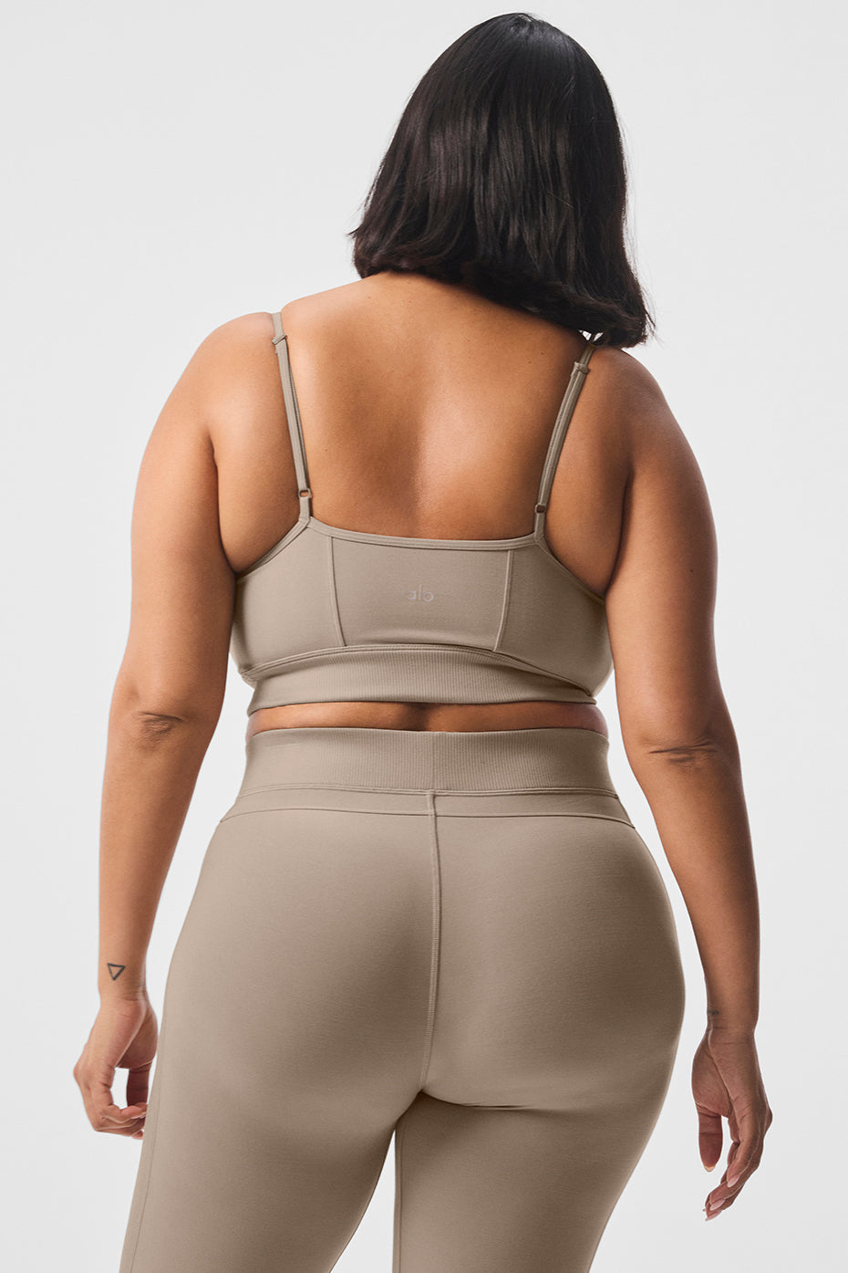 Front view of the Alosoft Head Start sports bra highlighting its soft brushed fabric and adjustable straps