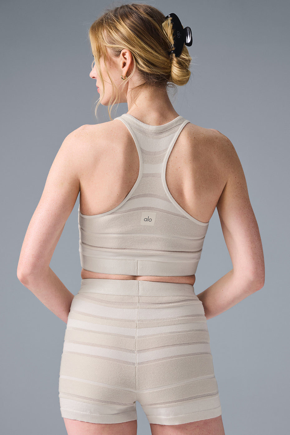 Womens ivory crop top styled with denim for casual summer look
