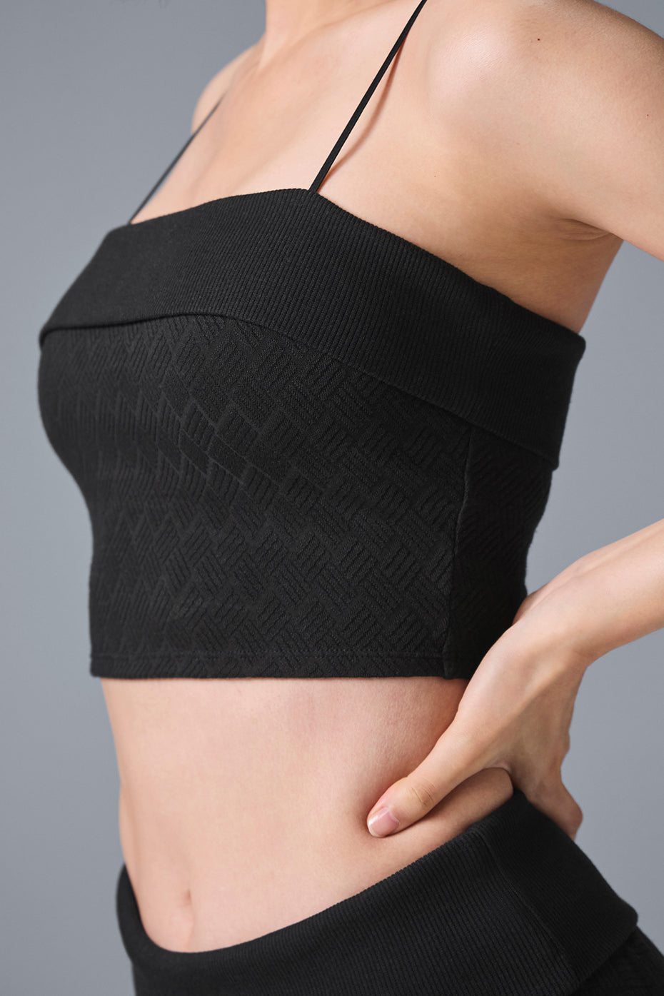 Side view of the Doubles Only tank top with built-in shelf bra, highlighting the adjustable straps.