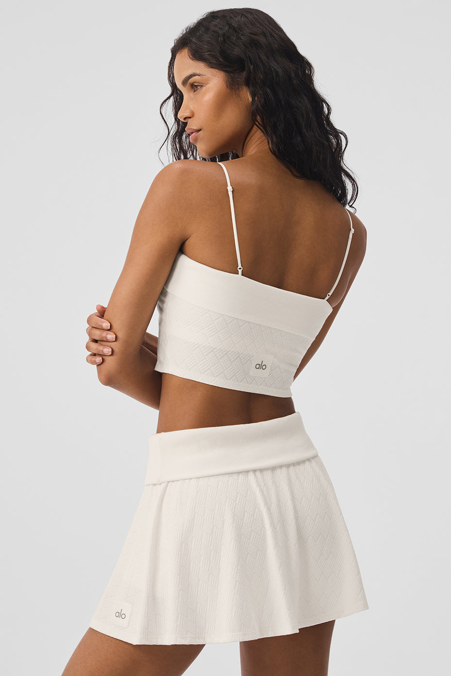 Side view showcasing the adjustable straps of the sports bra tank.