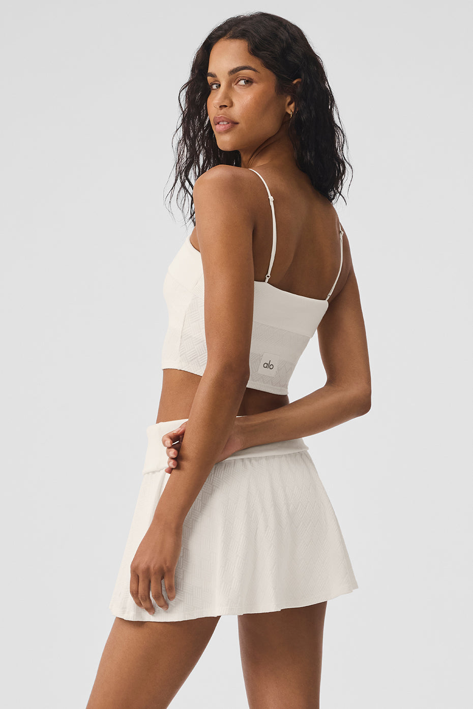 Back view highlighting the ribbed texture of the tank top.