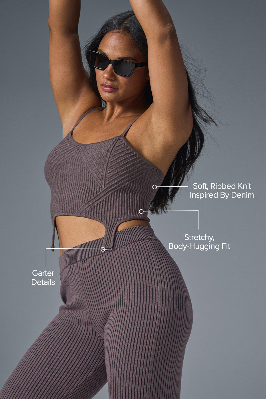 Model wearing the cropped tank top in a casual setting, highlighting its versatile style.