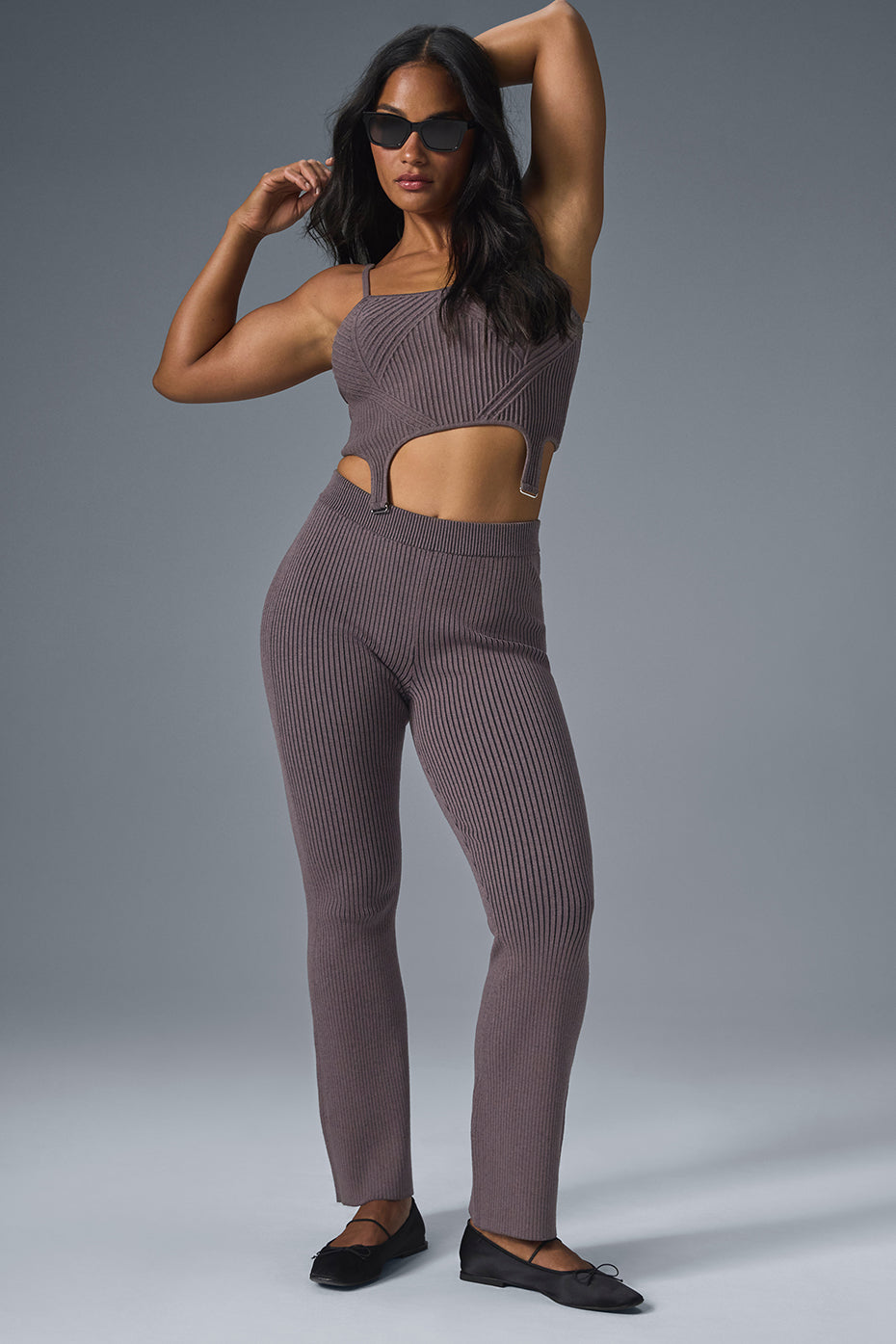Front view of the chic denim knit garter strap top, showcasing its texture and fit.