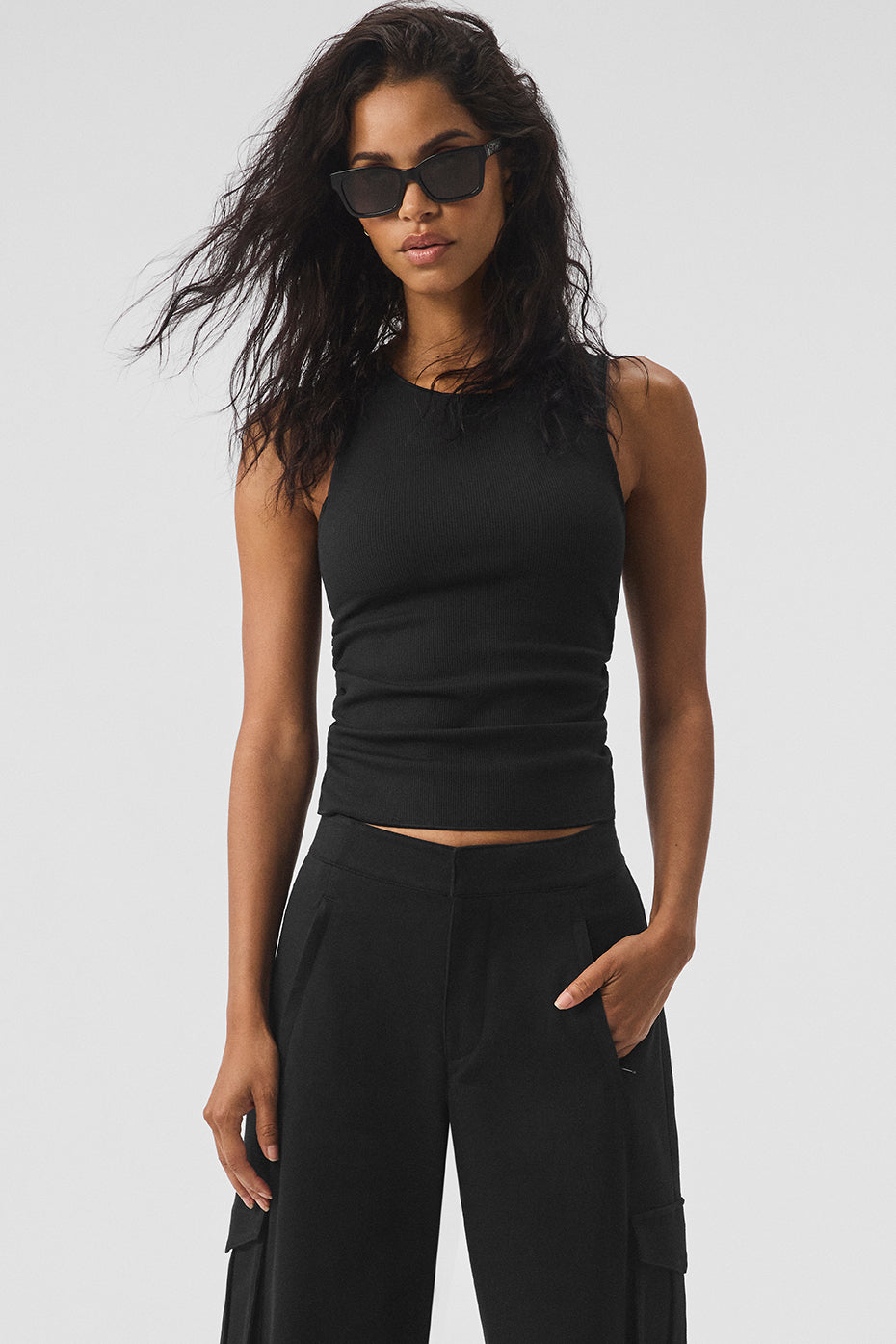 Close-up of men’s black ribbed tank top showing texture and fit