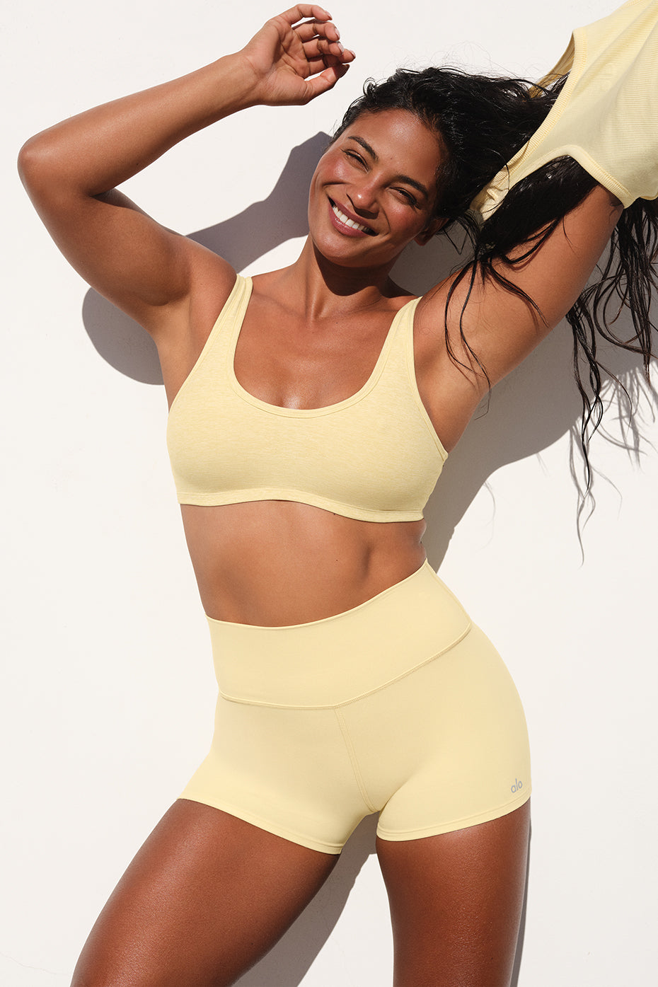 Front view of the Alosoft women's sports bra with scoop neckline in warm butter heather