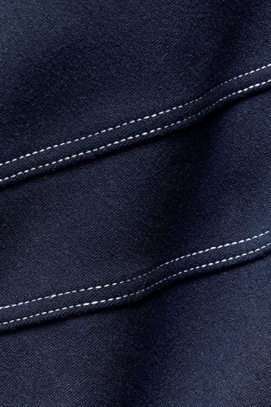 Side view of Alosoft Sunray bra paired with high-waist leggings