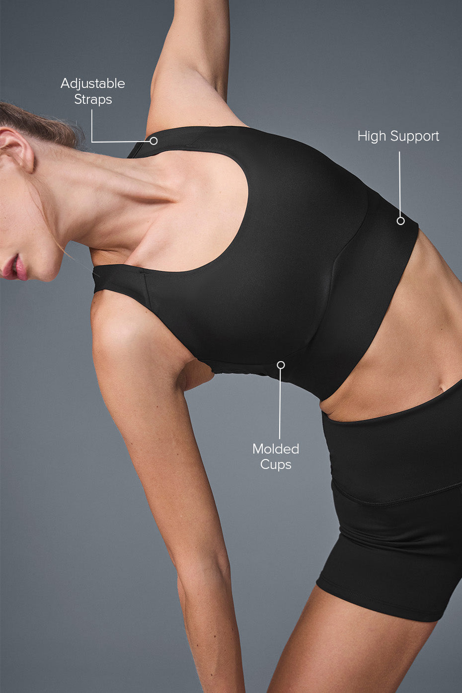 Model wearing the supportive sports bra during a running session outdoors