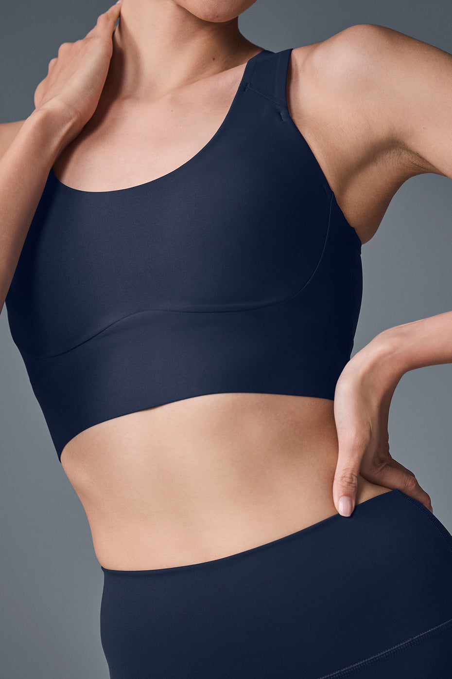 Showing adjustable straps of Airlift Empower Bra for personalized fit.