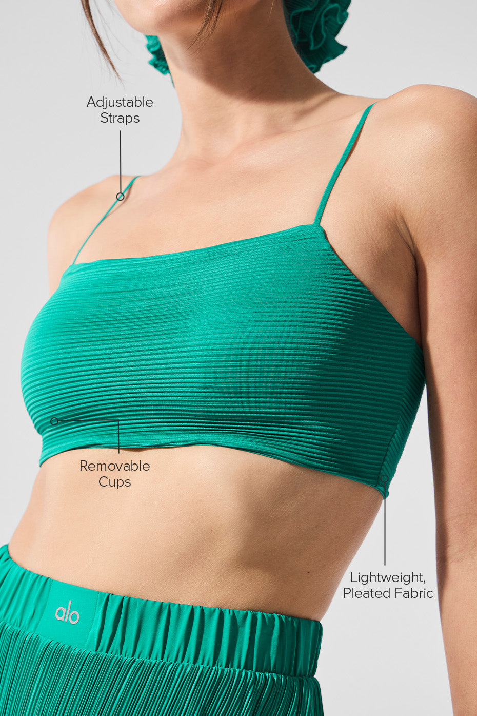 Model wearing Micro Plisse Sports Bra with matching Tennis Skirt.