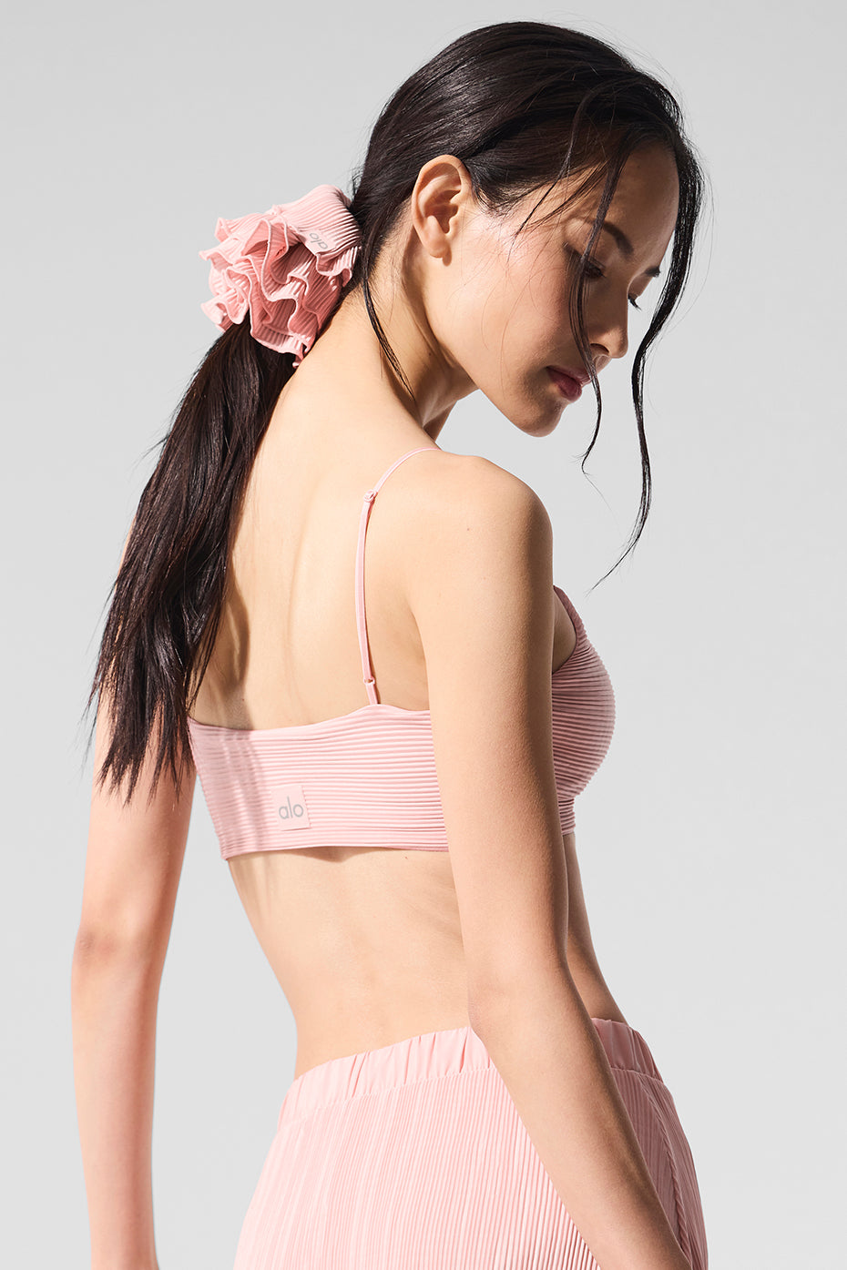 Back view of the plisse sports bra, highlighting its comfortable fit.