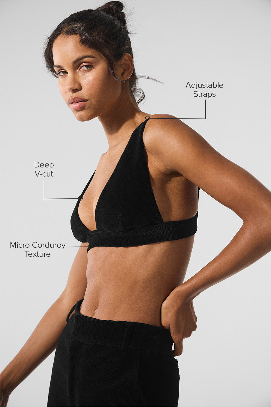 Side angle showcasing adjustable straps and elastic band for a tailored fit