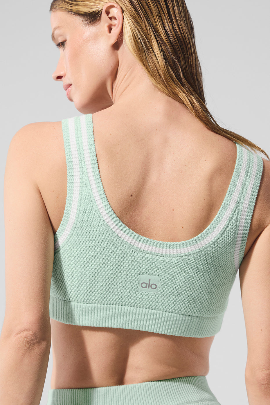 Front view of the Tenniscore cotton knit bra in spearmint color.
