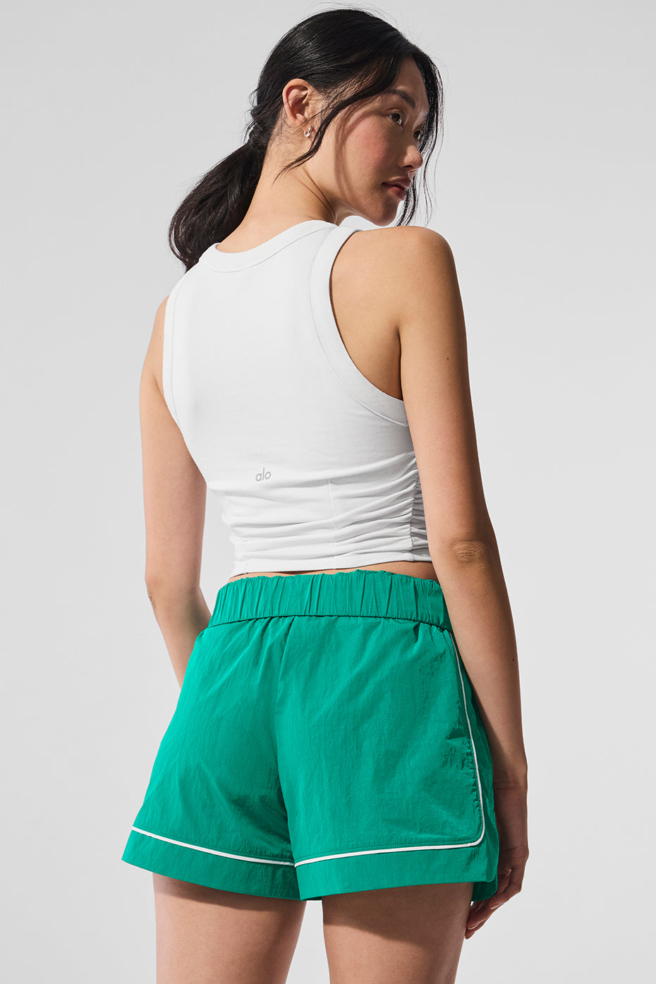 Front view of the Sway Active Bra Tank in white, showcasing its stylish design.