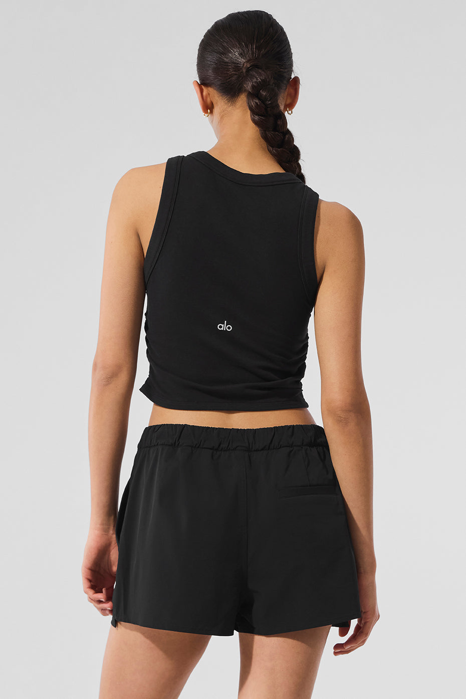 Model wearing the tank during a workout session