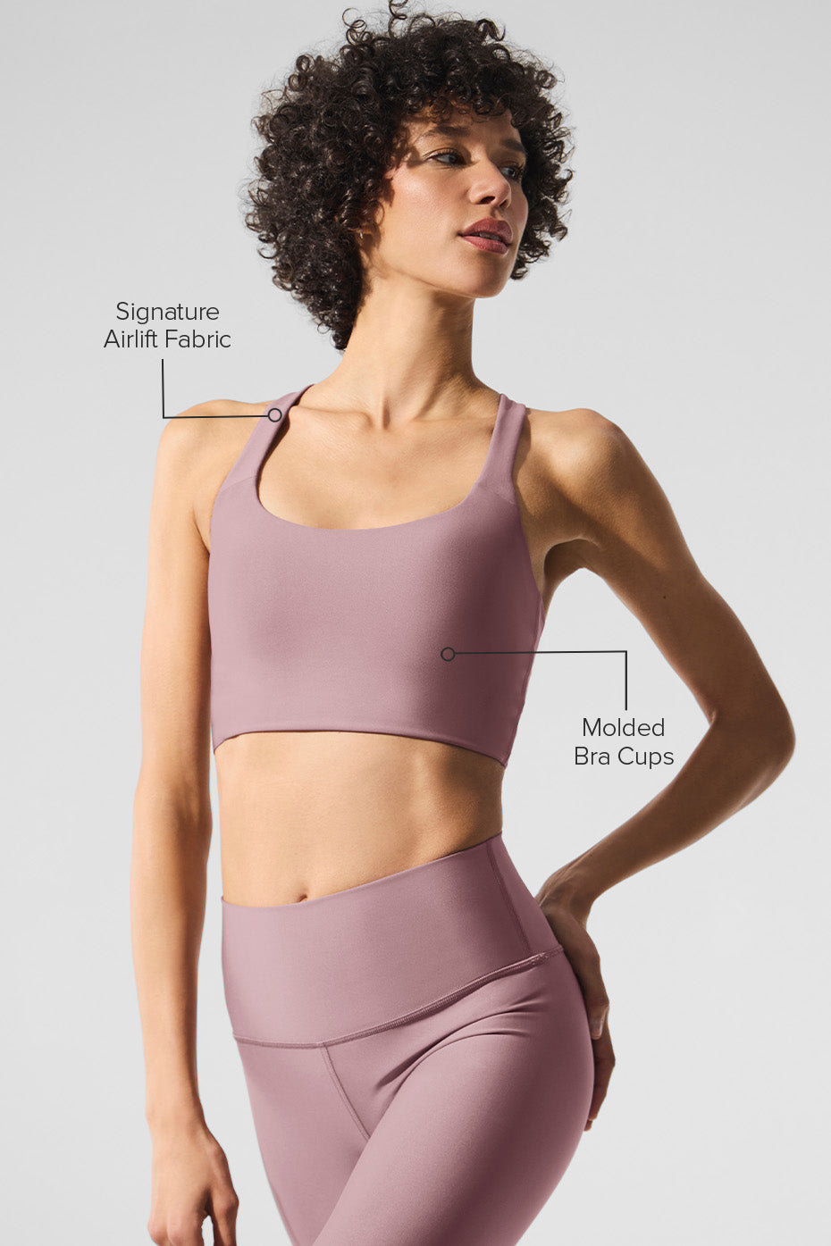 Back detail of sports bra tank top with loop-through racerback design
