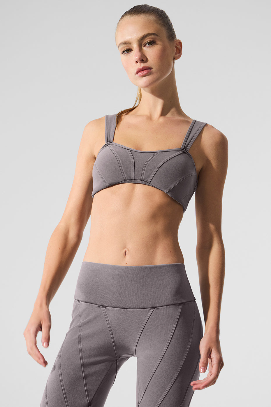 Alosoft Sunray sports bra styled with matching leggings for a chic workout look