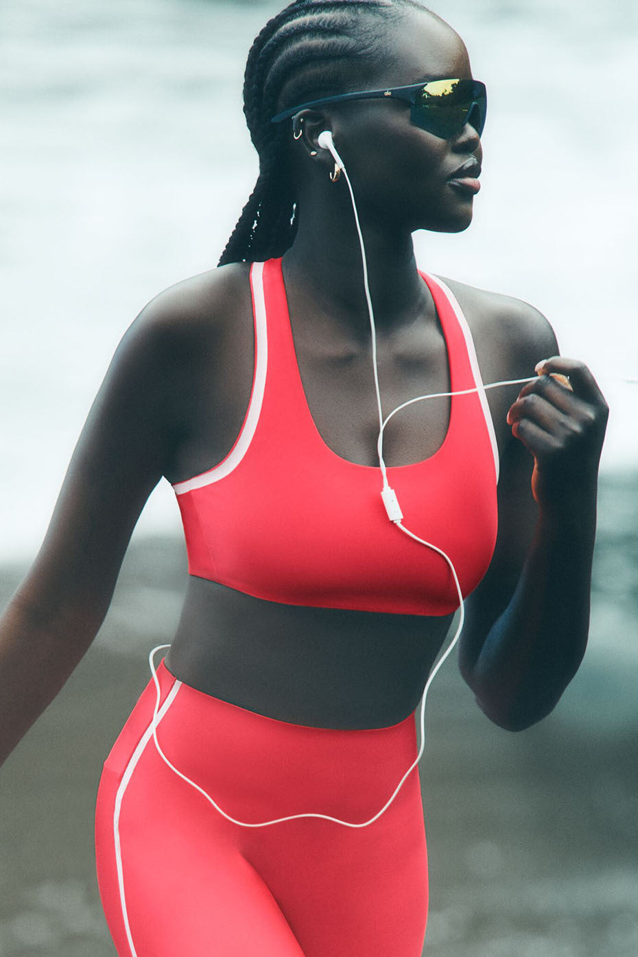 Airlift sports bra in Candy Red/White, front view with contrast stitching
