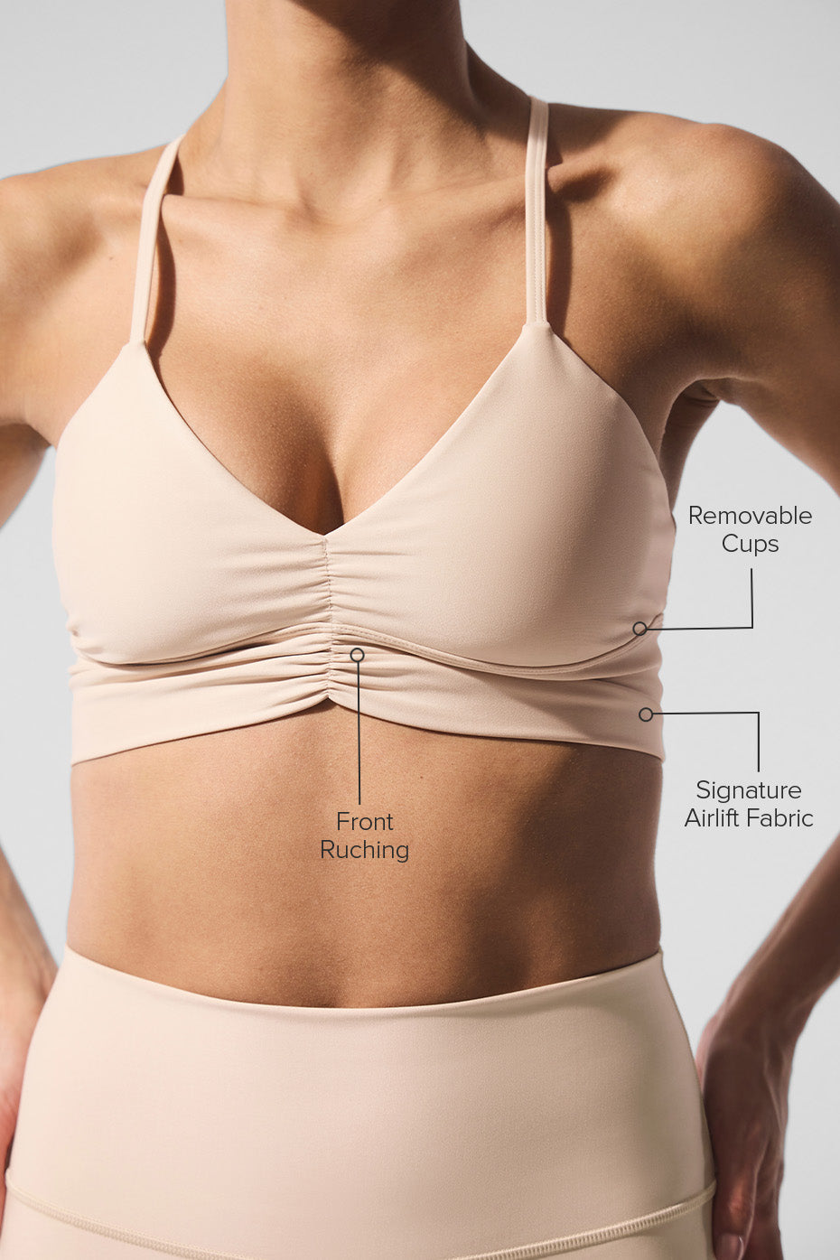 Front view of the Macadamia-colored Airlift Divine bra with ruching detail