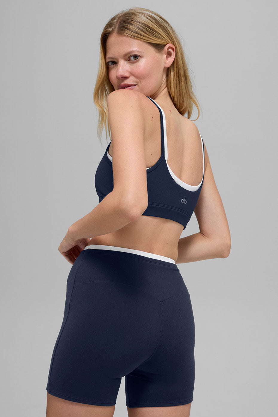 Woman wearing the high impact sports bra during an energetic workout session
