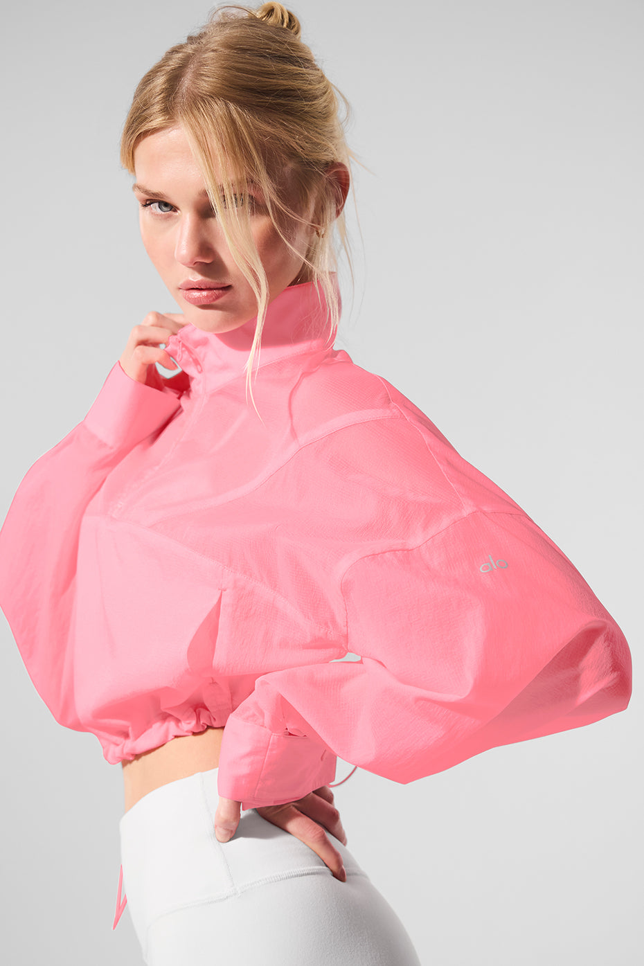 Front view of the Neon Bubblegum Quarter Zip Top showcasing its sleek design.