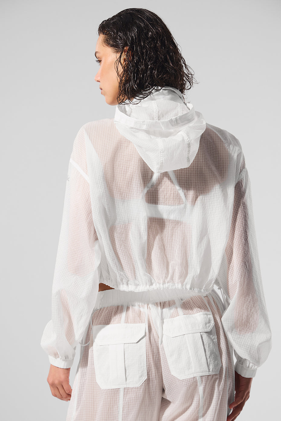 Casual summer outfit featuring a lightweight cropped jacket over a bikini