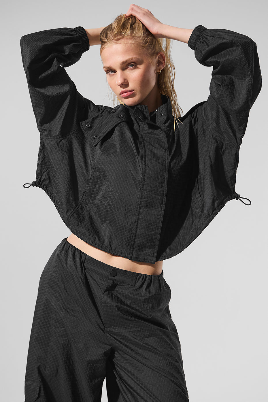 Front view of the Scholar Knit Cropped Full Zip Jacket in black, showcasing its stylish design.