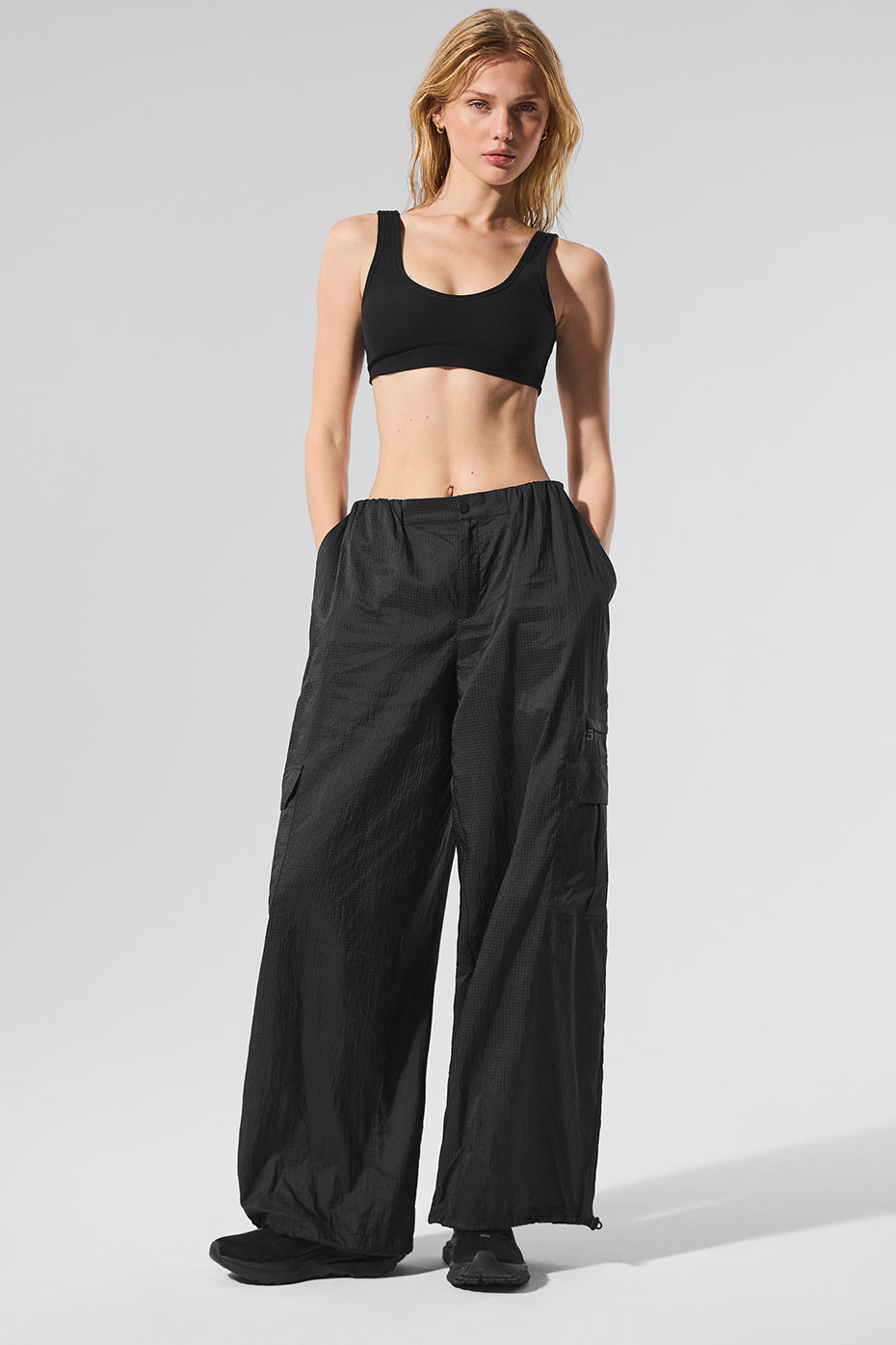 Front view of Urban Utility Wide Leg Joggers in black, showcasing cargo pockets.