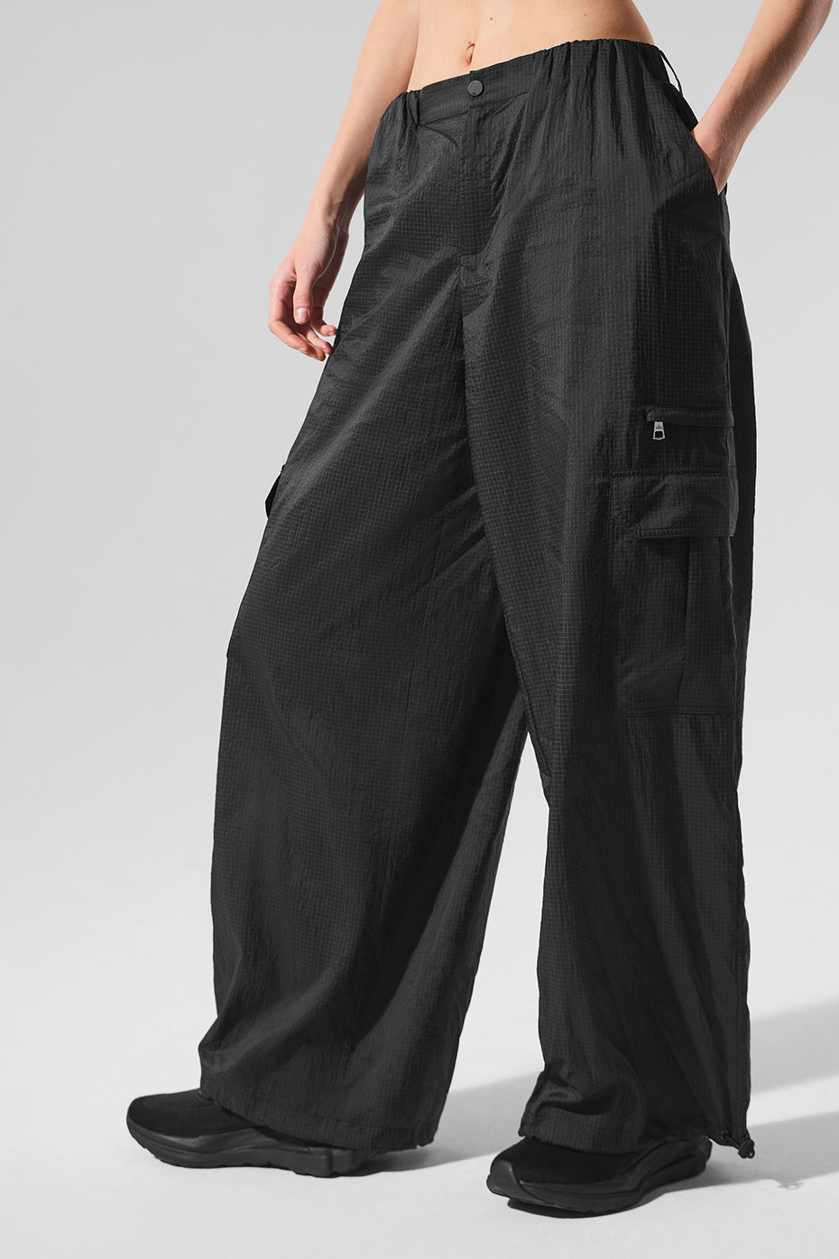 Front view of Urban Utility Wide Leg Joggers in black, showcasing cargo pockets.