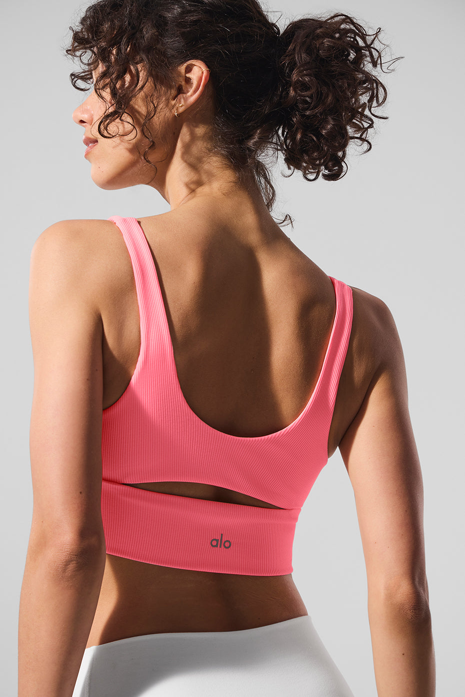Side angle showing stretch fit and cutout airflow zones in this lululemon sports bra alternative