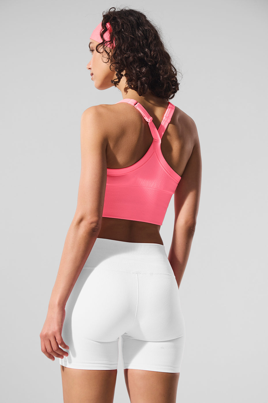Flat lay of comfortable sports bra and matching seamless bottoms styled for weekend wear