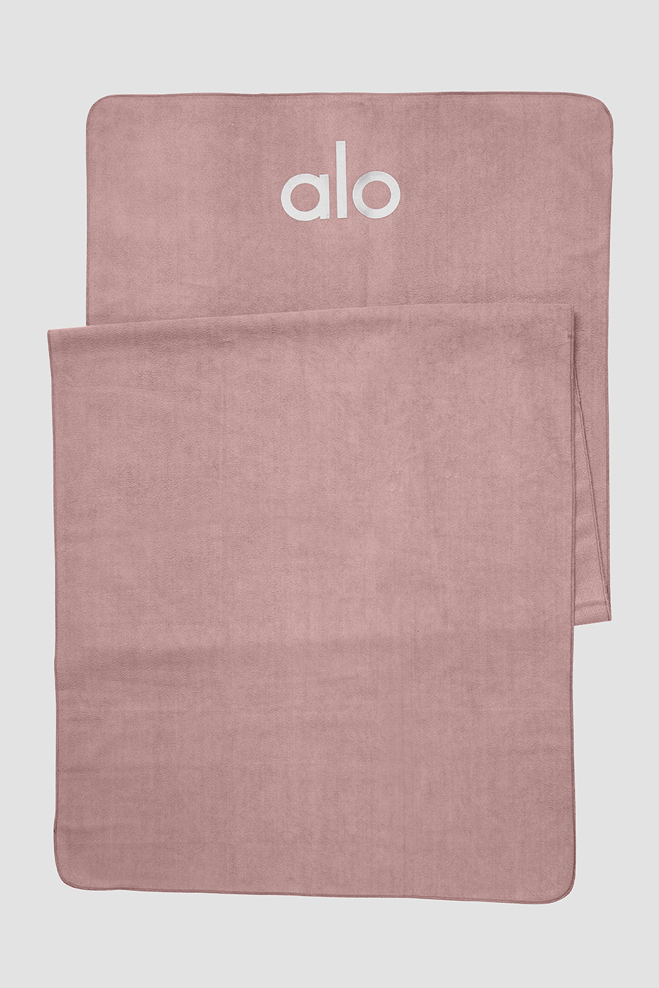 Close-up of the smoky quartz non-slip yoga towel showing silicone grip pattern.