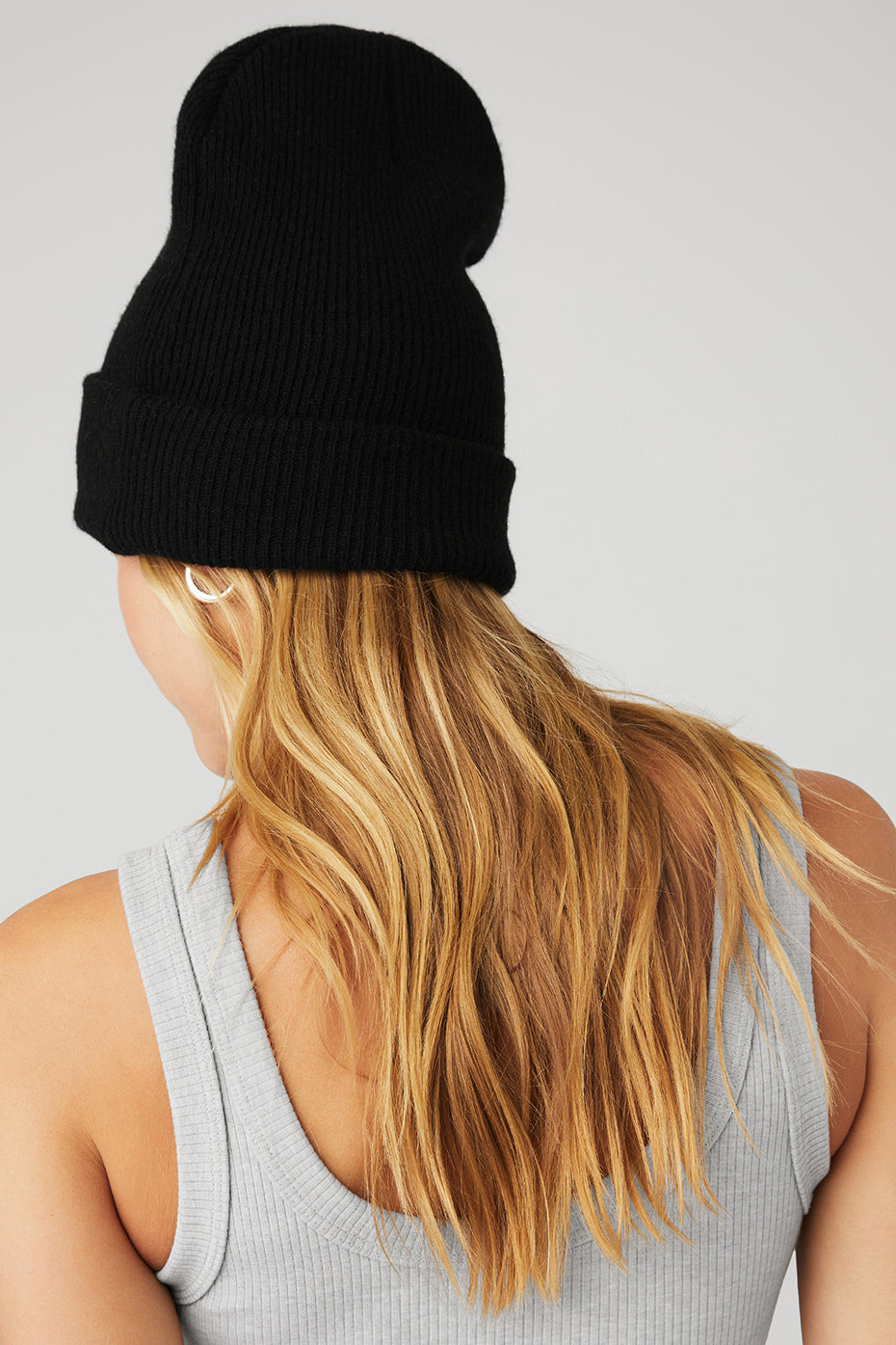 Close-up of the cozy wool beanie in black, showcasing its soft texture.