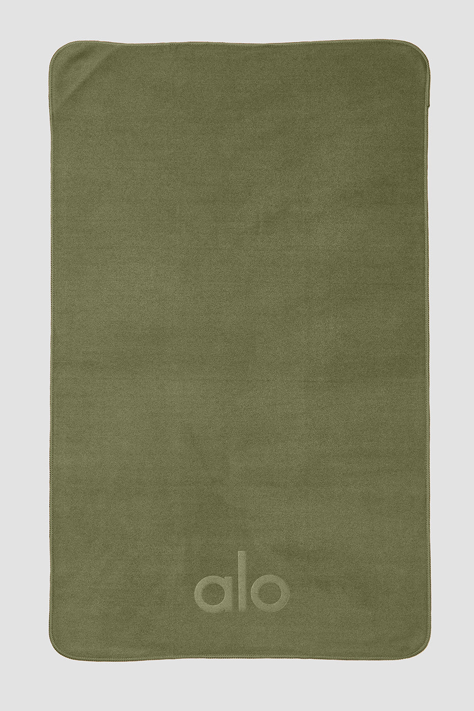 Close-up of the jungle design on the microfiber yoga towel.