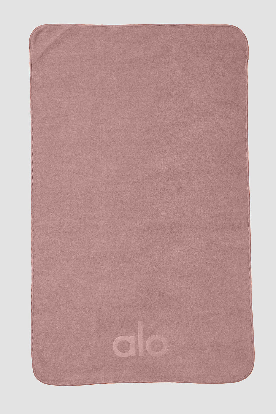 Close-up of the smoky quartz yoga towel, showcasing its soft texture.