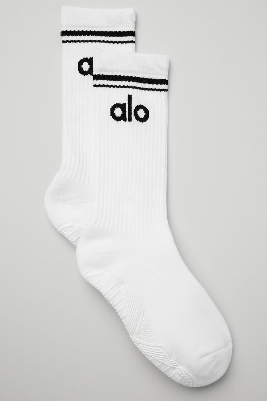 Front view of Classic Throwback Barre Grip Socks on a yoga mat.