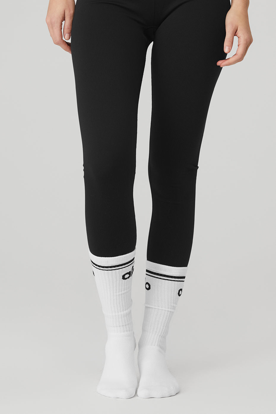 Side angle showcasing the classic stripe detail of the barre socks.