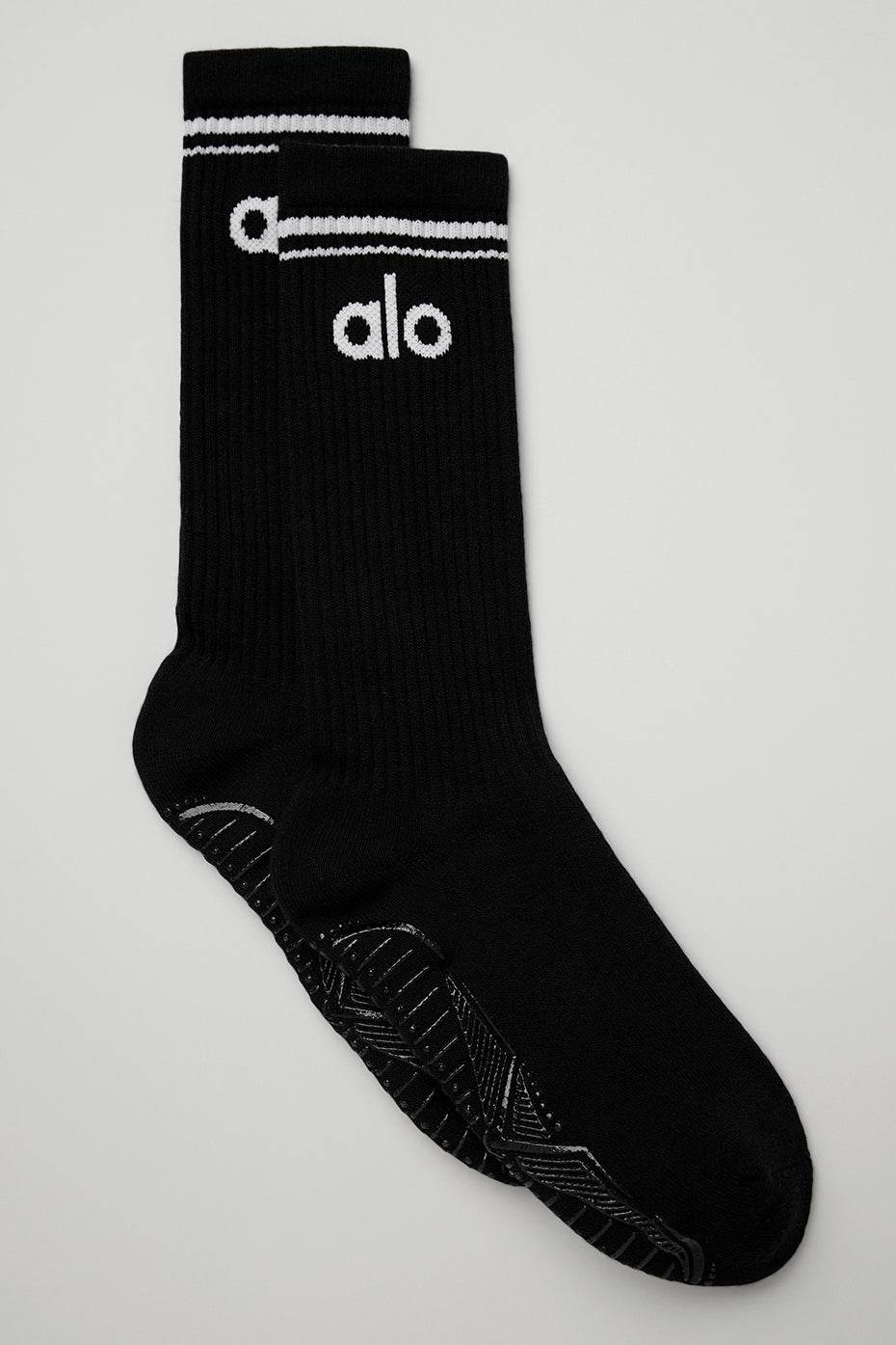 Close-up of classic black and white barre socks showing soft texture.