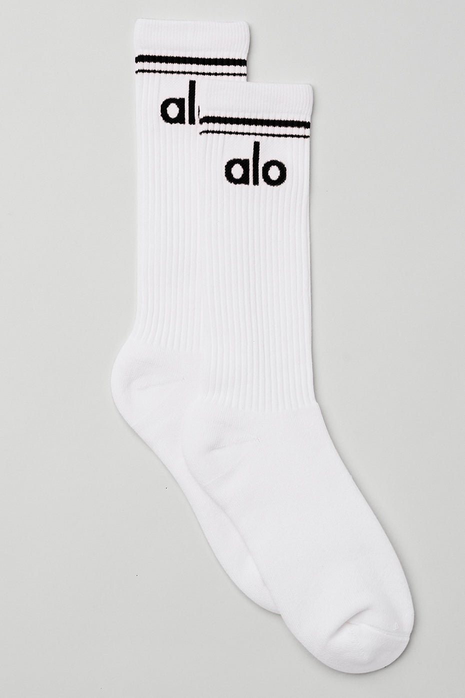 Close-up of black and white striped sock cuff with retro design