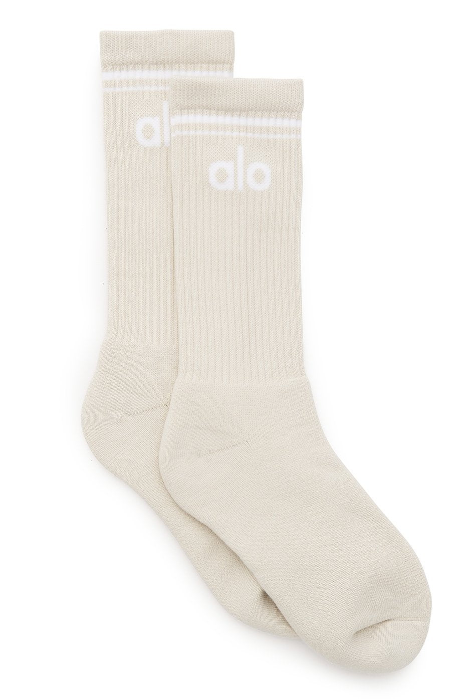 Bone white unisex throwback socks displayed with sneakers.