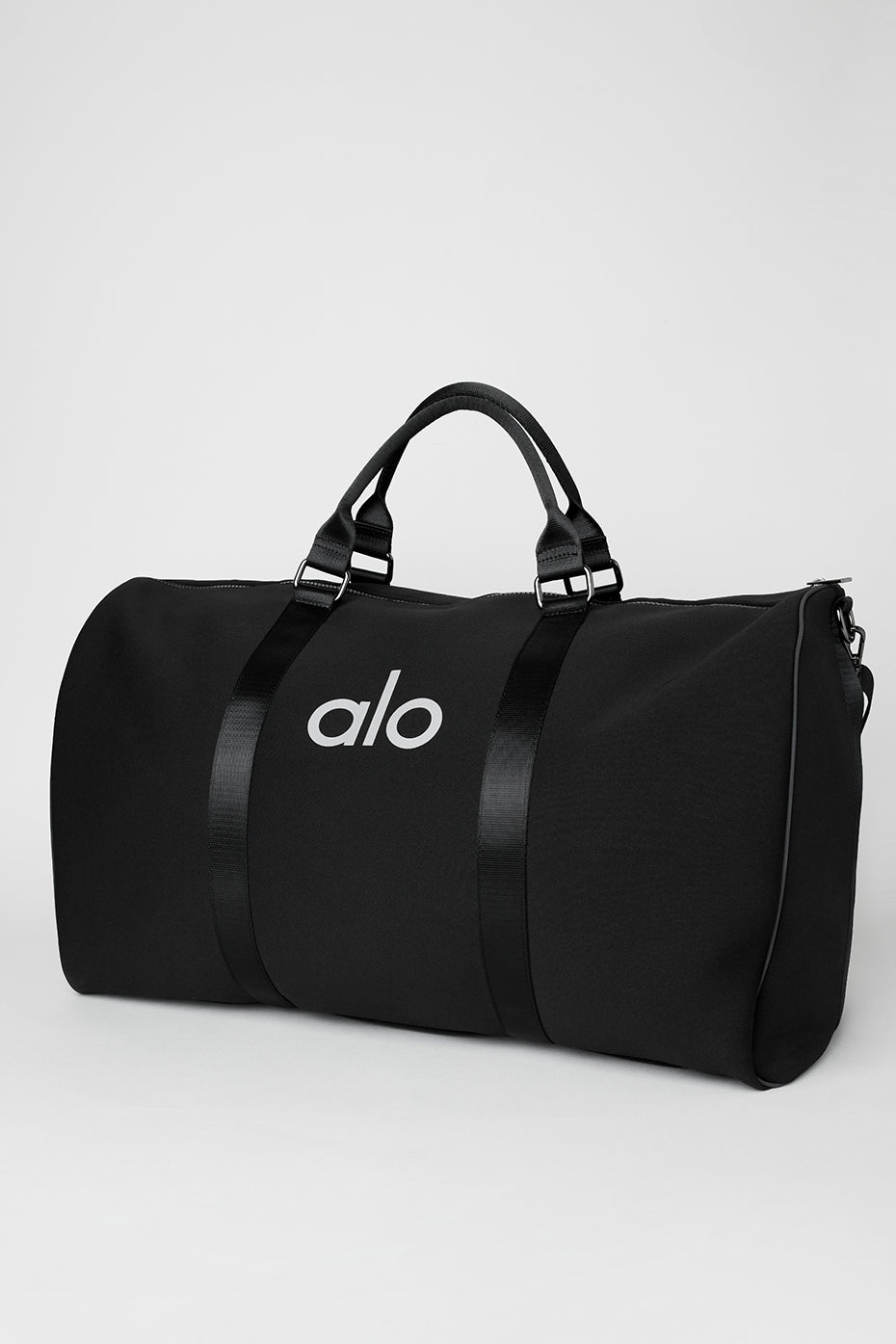 Front view of the luxe neoprene weekender duffle bag in black and silver.