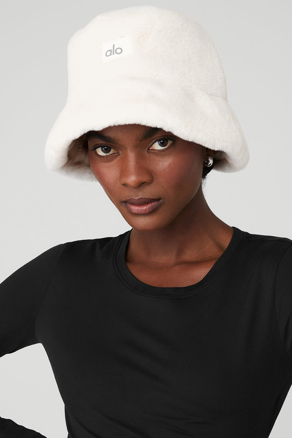 Unisex model showcasing the hat’s adjustable fit